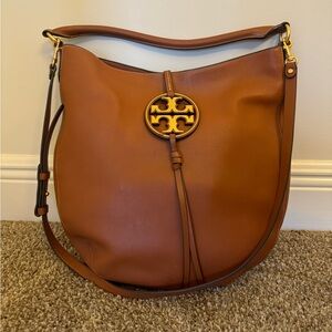Tory Burch Miller Metal hobo. Small stains inside as pictured. Great condition.